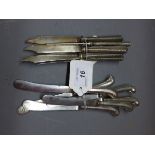 A set of six silver handled knives, hallmarked Sheffield,