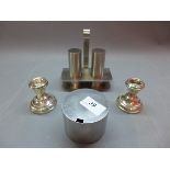 A pair of dwarf silver candle sticks and 1970's modernist chrome cruet set with sugar bowl