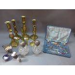 Two silver topped jars and three silver cruets,