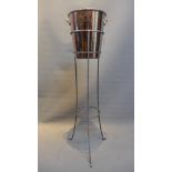 A Seau A Glace champagne bucket on metal stand