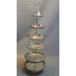 A large six tier silver plated cake stand,