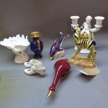 A collection of ceramics to include a Goldscheider zebra, A Rosenthal candelabra,