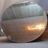 A circular bevelled plated wall mirror. Diameter.