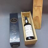 A boxed bottle of Burmester port 1985 and a bottle of Hennesey Bras D'or cagnac