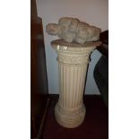 A Corinthian style column pedestal,