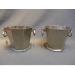 A pair of ice buckets in heavy cast aluminium