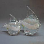 A pair of glass fish, signed,
