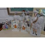 A quantity of Victorian Staffordshire pottery figurines (5)