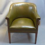 An early 20th Century green leather tub chair.