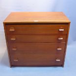 A mid 20th Century teak chest of four drawers,