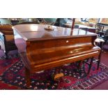 A vintage Steck baby grand piano.