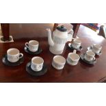 A Mid Winter black and white tea set