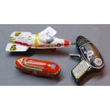 Three vintage tin plate toys comprising an Atomic space gun (a/f),