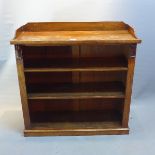 A 19th Century rosewood open bookcase with gallery top raised on stepped base,