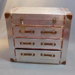 An aviator style chest having hinge lid over three drawers. H-80cm, W-89cm, D-42cm.