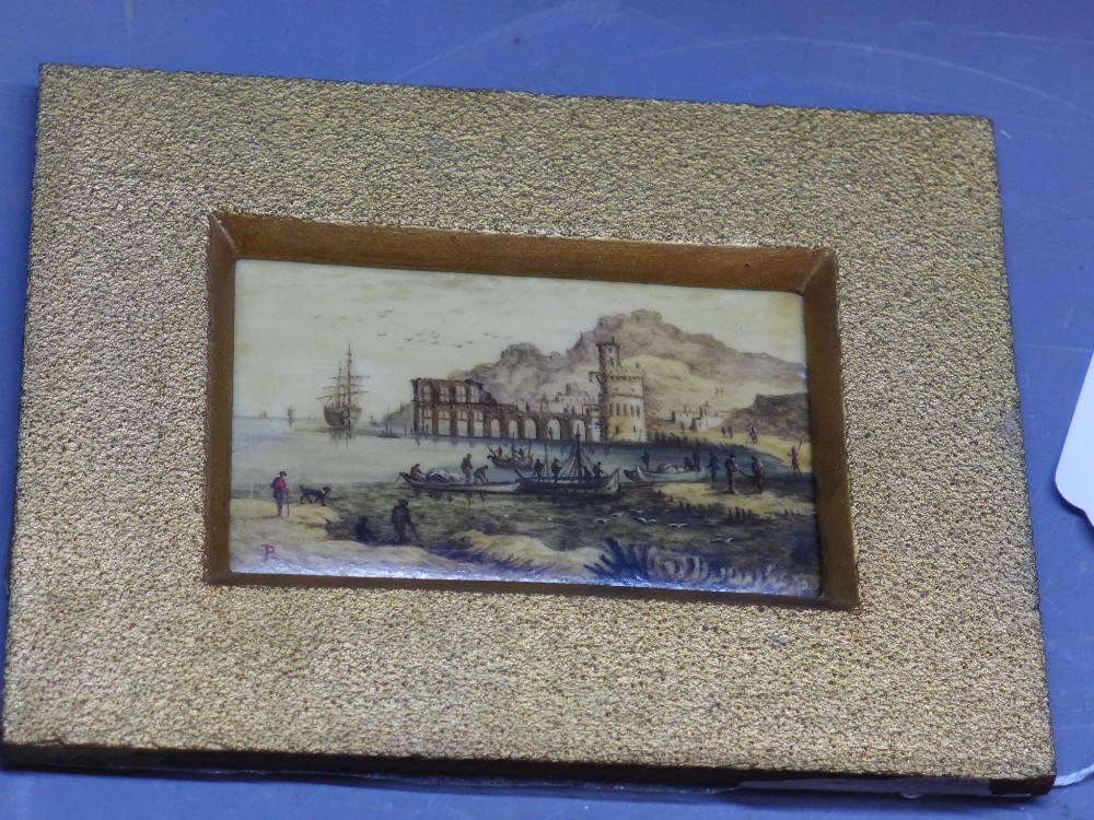 An 18th Century ivory plaque hand painted with figures and boats in a coastal scene.