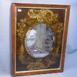 A painting on glass of a Rococo mirror with central oval mirror plate, 80cm x 59cm.