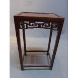 A small Chinese hardwood side table,