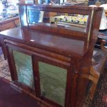 A mahogany side cabinet, one long drawer over two door with mirrored back.