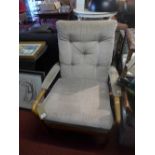 A Parker Knoll arm chair.