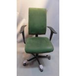 A Norwegian 'Hag' office chair with green suede upholstery.