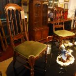 A pair of simulated rosewood bedroom chairs with bobbin supports.