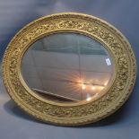 An oval giltwood bevelled plate mirror.