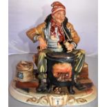 Studio art pottery man sitting with fire, signed