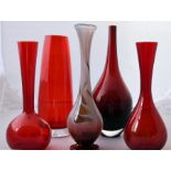 Collection of five red art glass vases, signed to the base