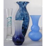 Collection of four blue art glass