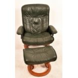 Reclining green leather chair and foot stool