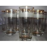 Collection of eight gold rimmed glasses