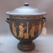 A 19th Century basalt urn with Grecian decor,