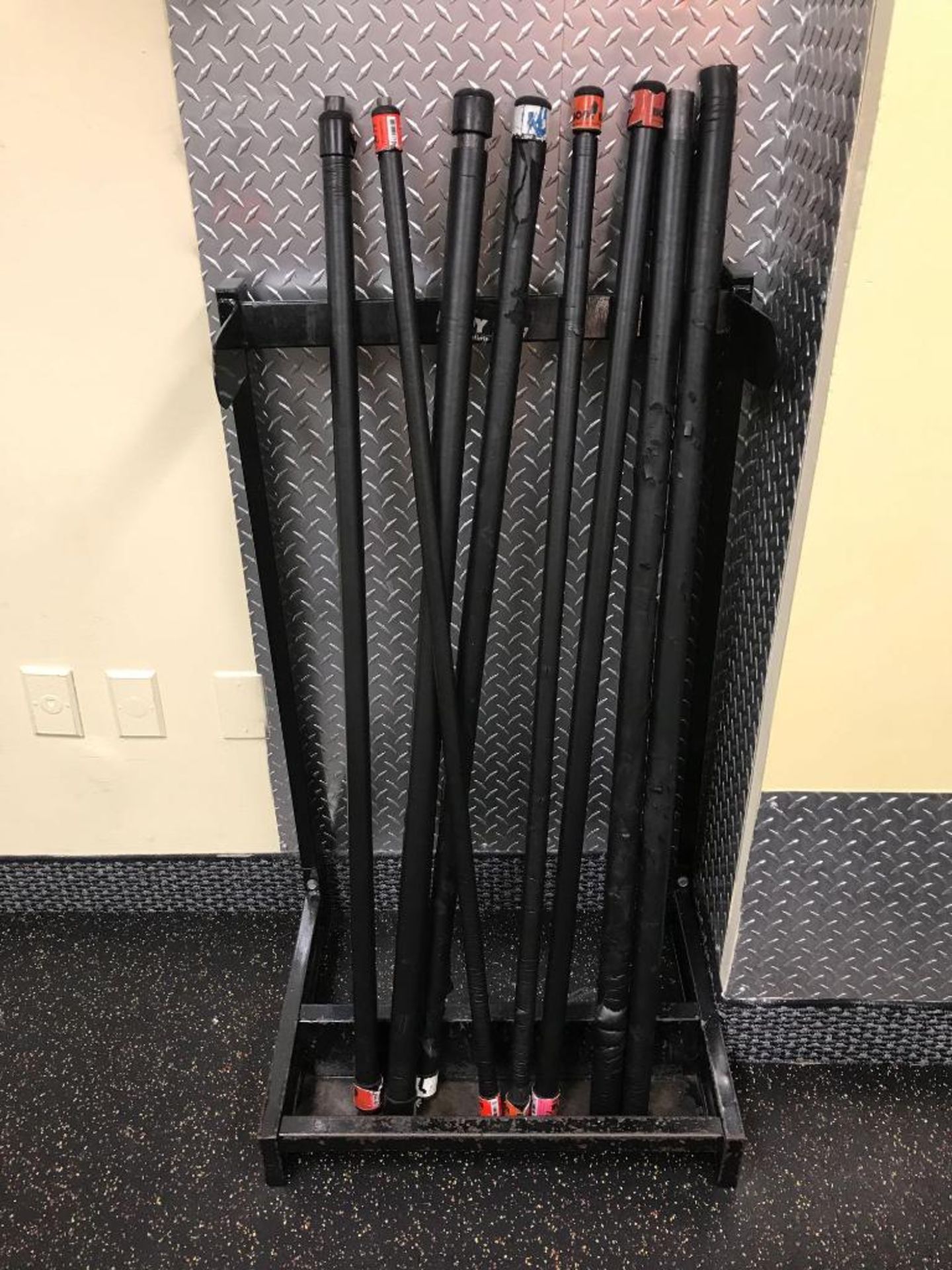 Rack of Assorted Barbells