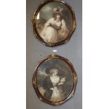 A PAIR OF VICTORIAN PRINTS OF LADIES IN OVAL MAHOGANY AND GILT FRAMES