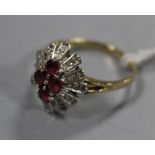 A GOLD RUBY AND DIAMOND RING