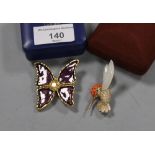 A BOXED YVES SAINT LAURENT BUTTERFLY BROOCH, TOGETHER WITH A HUMMINGBIRD BROOCH