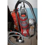 A VAX DUAL CARPET WASHER TOGETHER WITH A MULTI CYCLONE VACUUM, ETC