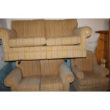 A GAINSBOROUGH UPHOLSTERED THREE PIECE SUITE AND STOOL