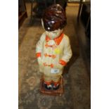 A LARGE VINTAGE CERAMIC FIGURE OF A BOY