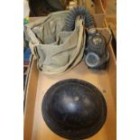 A WW2 STEEL TOMMY HELMET, GAS MASK, GAS MASK BAG & EYE SHIELDS