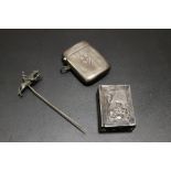 A HALLMARKED SILVER VESTA CASE, JOCKEY STICK PIN + A MATCH BOX HOLDER (3)