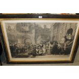 A LARGE FRAMED ENGRAVING OF A STREET SCENE