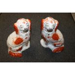 A PAIR OF STAFFORDSHIRE FLATBACK STYLE SPANIELS