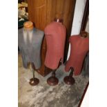 THREE VINTAGE BROWN FABRIC COVERED TAILORS DUMMIES COMPLETE WITH STANDS