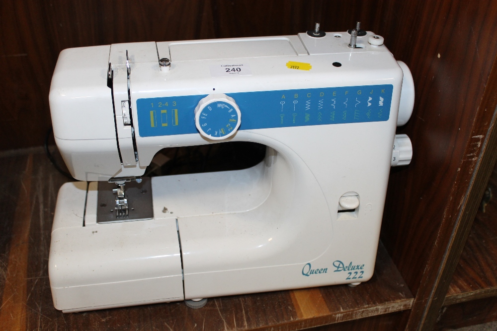 A QUEEN DELUXE 222 SEWING MACHINE