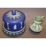 A 19TH CENTURY JASPERWARE CHEESE DOME A/F + A GREEN WEDGWOOD JASPERWARE JUG