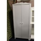 A MODERN WHITE TWO DOOR WARDROBE