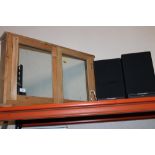 A GLASS DISPLAY CASE TOGETHER WITH TWO MORDAUNT-SHORT SPEAKERS