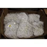 A BOX OF 12 X BAGS OF VINTAGE WHITE SATIN SUSPENDER BELTS, EACH BAG CONTAINING APPROX 10